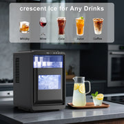 Ice maker on a kitchen counter with various drinks displayed above it.